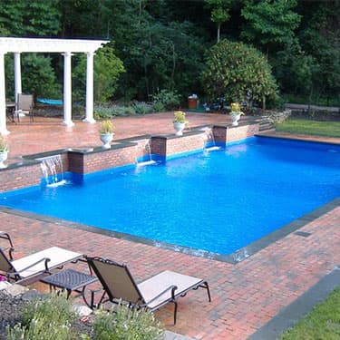 Custom in-ground pool and backyard design by Poolmasters, photo 1